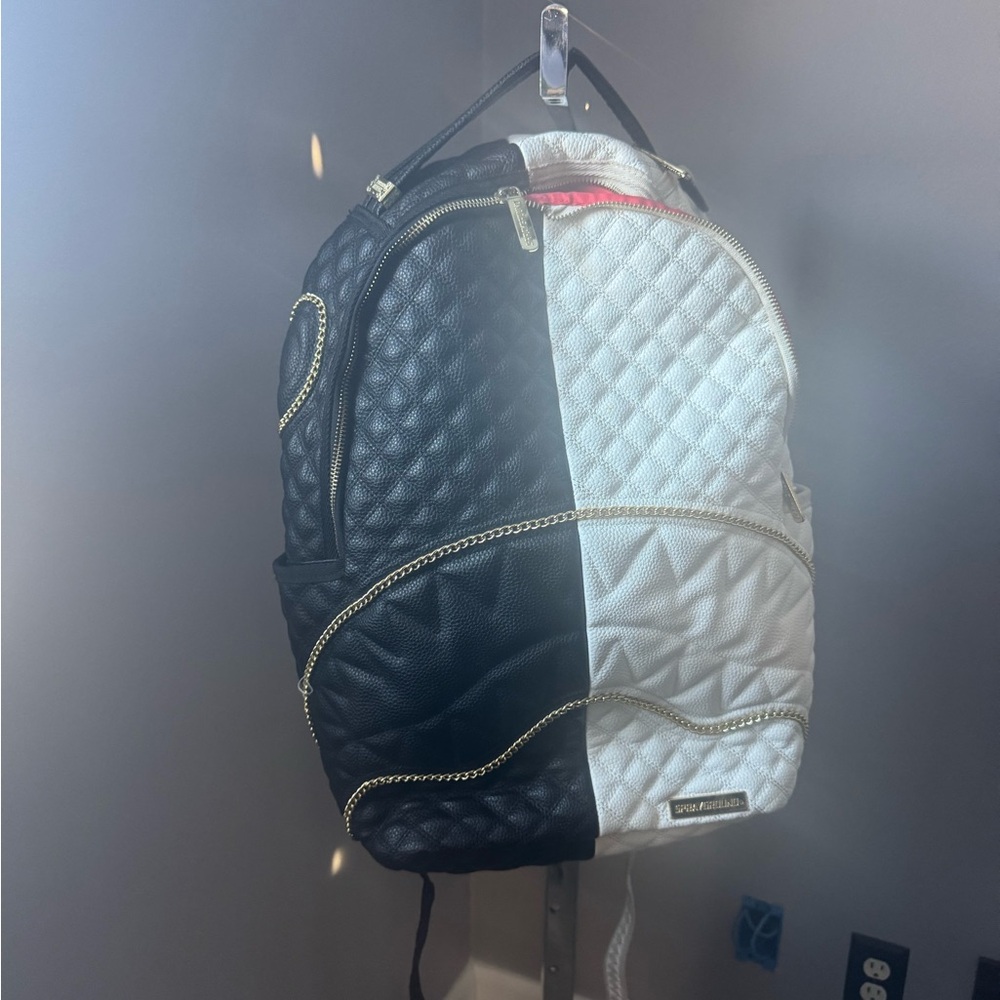 Sprayground Black & White Quilted Split-Panel Backpack with Gold Trim